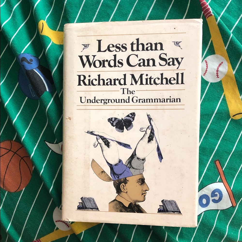 Less Than Words Can Say by Richard Mitchell — Hardcover Book, Cream Cover